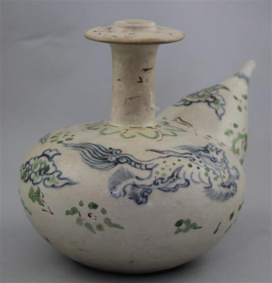 An Annamese underglaze blue and enamelled kendi, 16th century, height 17.5cm, restorations